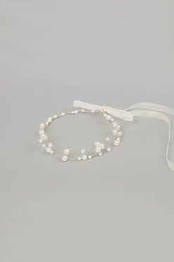 Coroncina morbida con perle
