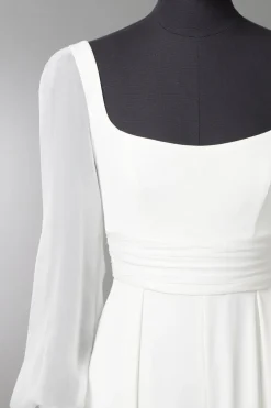 Tuta in crepe con maniche in chiffon